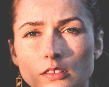 Image of a woman's face. The woman is suffering with an invisible illness, but you cannot see it. She looks fine. The purpose of the image is to show what an invisible illness is.